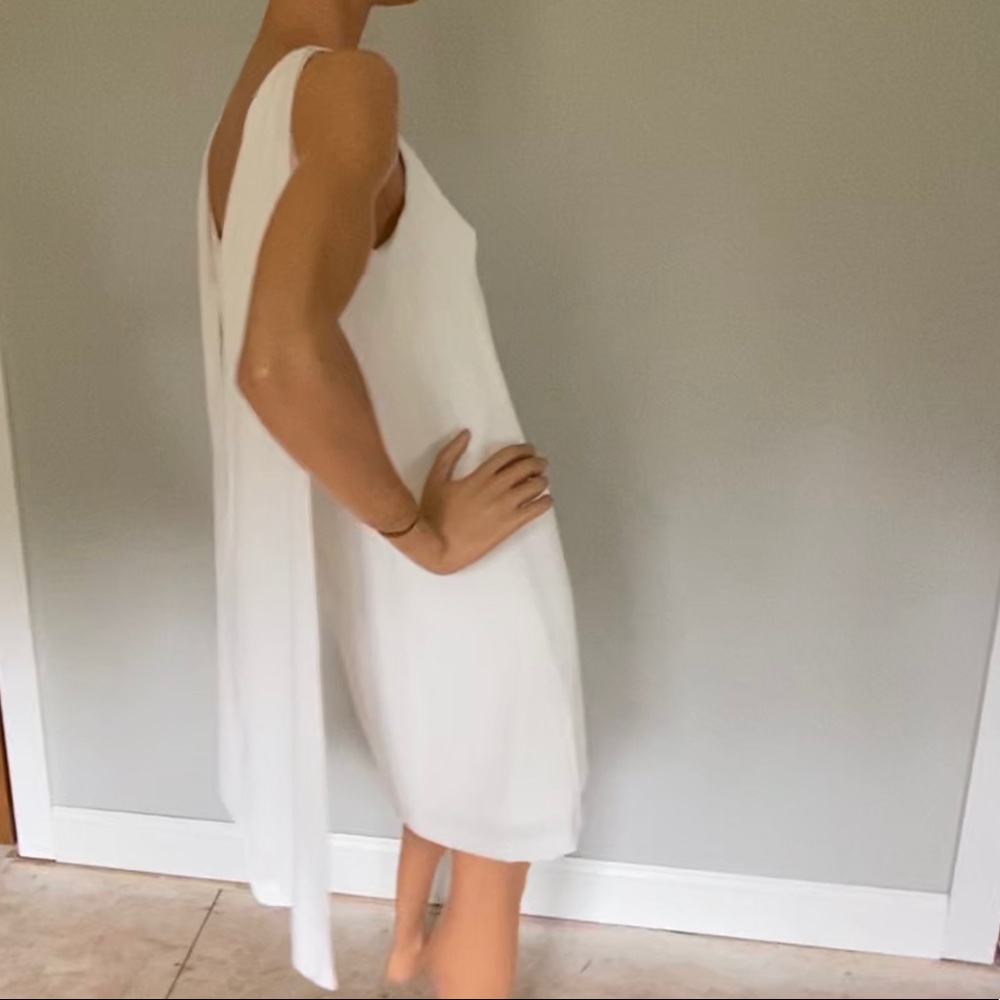 White dress with back cape/drape detail